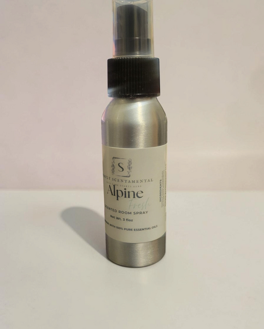 Simply Scentamental Alpine Fresh room and linen spray in a silver aluminum bottle with a black spray nozzle.