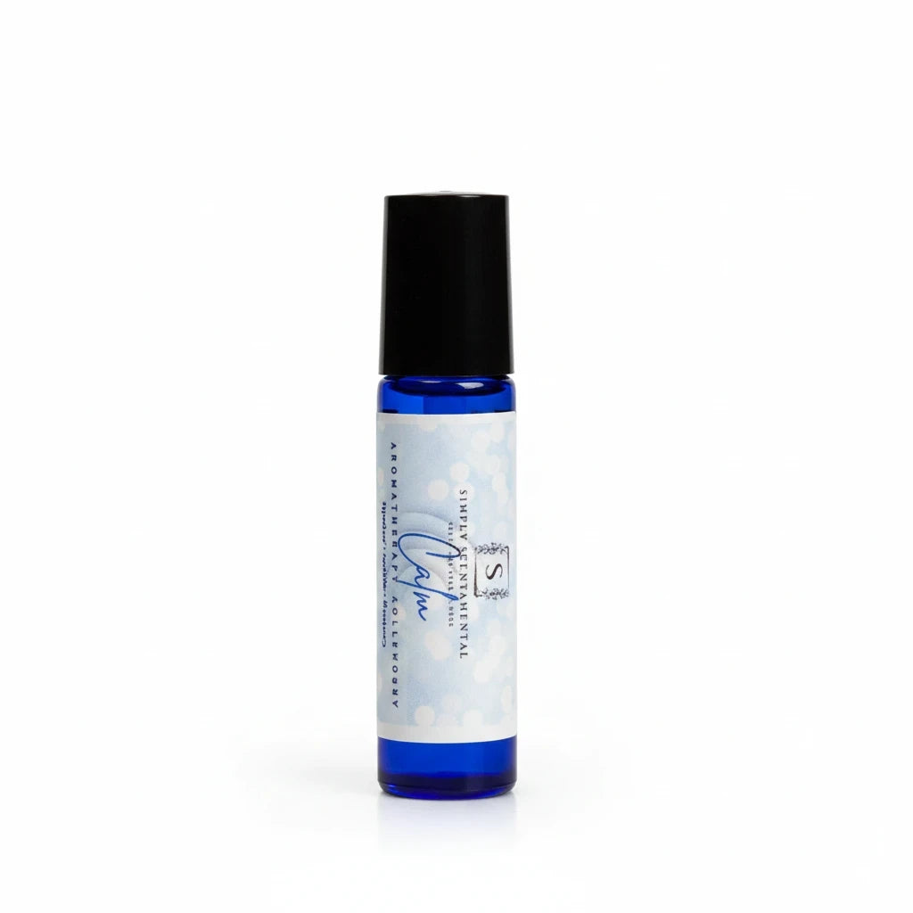 Simply Scentamental Calm aromatherapy rollerball in a blue glass bottle with essential oils for stress relief.