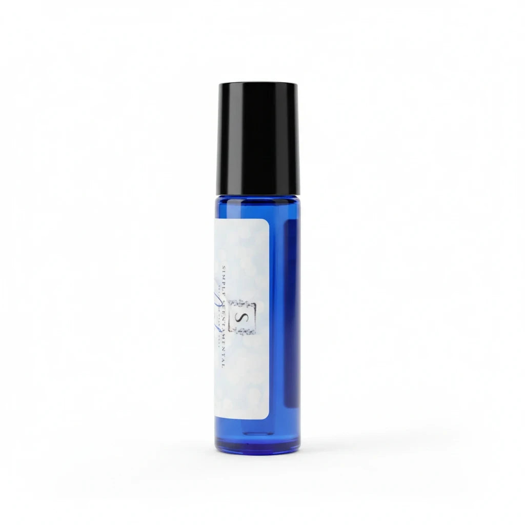 Simply Scentamental Calm aromatherapy rollerball in a blue glass bottle with a black cap for essential oil application