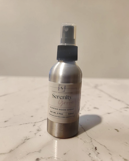 Simply Scentamental Serenity Grove room and linen spray in a silver metal bottle with a black spray nozzle
